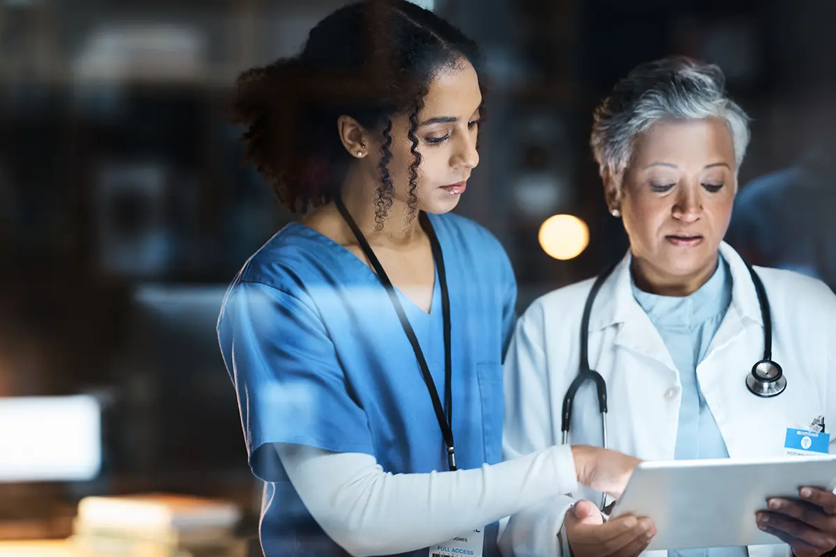 physicians checking health records