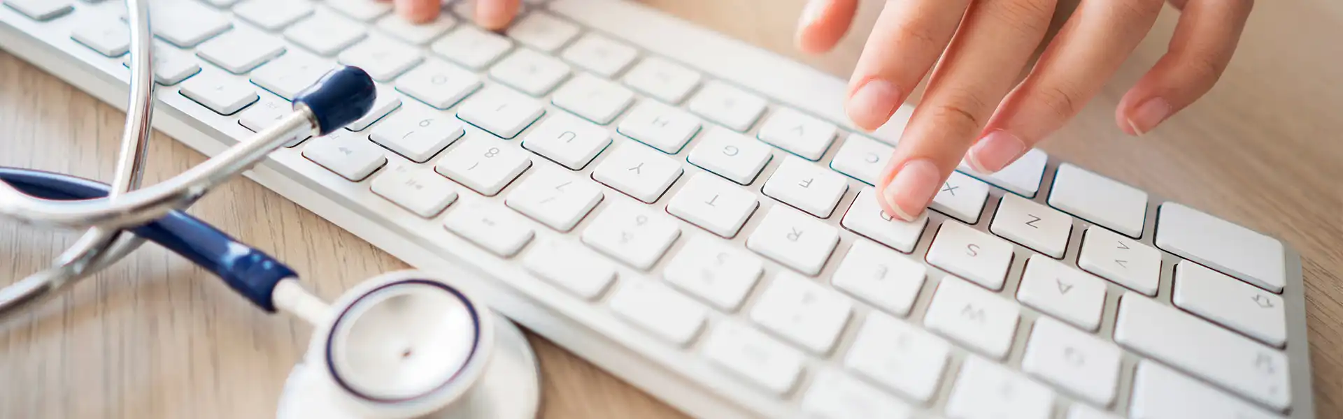 female physician typing