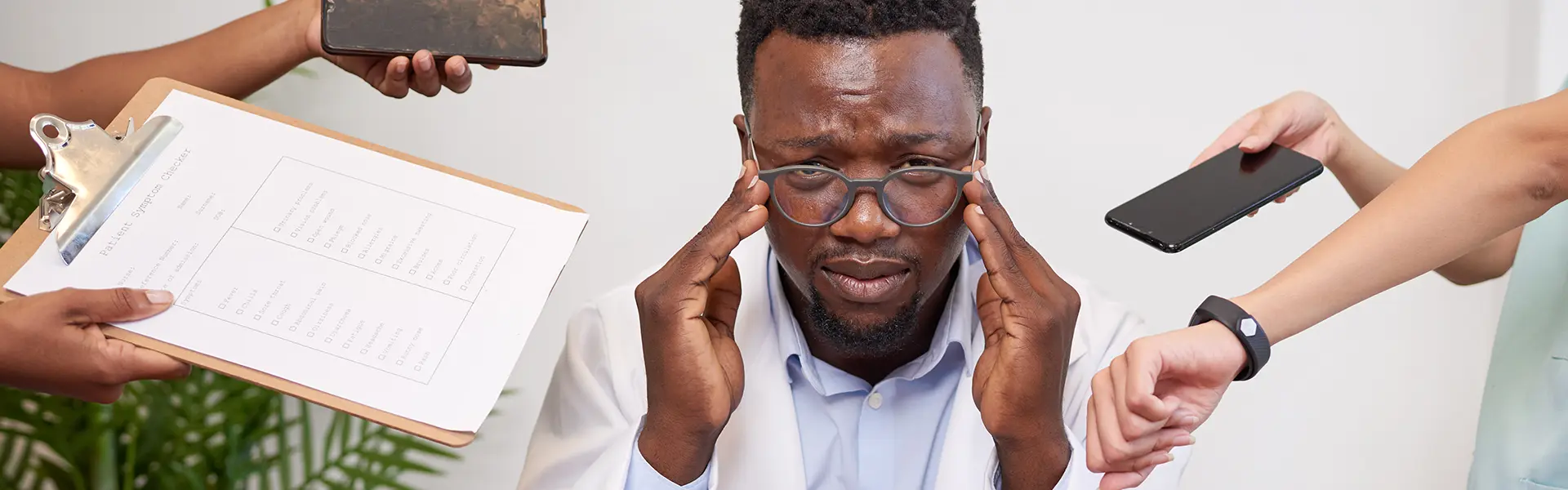 Stressed and overwhelmed doctor