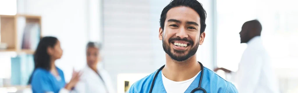 Happy-Physician-with-tablet-in-hand