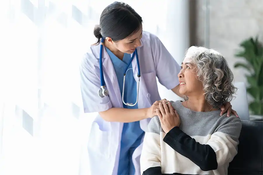 Female doctor give empathy encourage retired patient