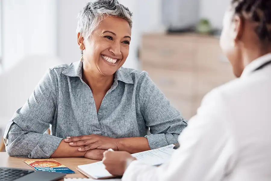 doctor consulting a happy patient