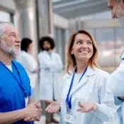 Group of doctors talking during conference