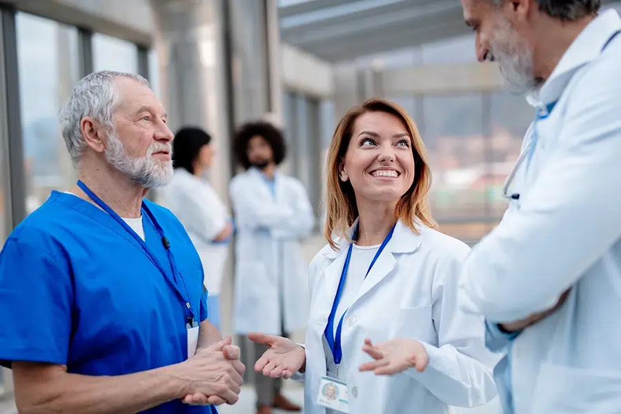 Group of doctors talking during conference