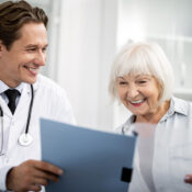 smiling-to-his-happy-elderly-patient