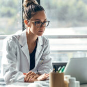 Female doctor talking while explaining medical treatment