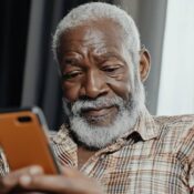 Elderly-patient-engaging-with-mobile-healthcare-solution