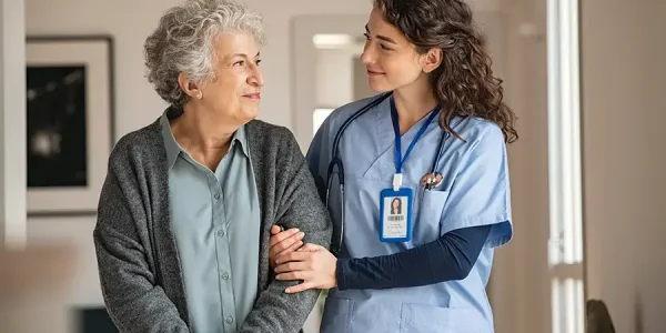 Caregiver assist senior woman